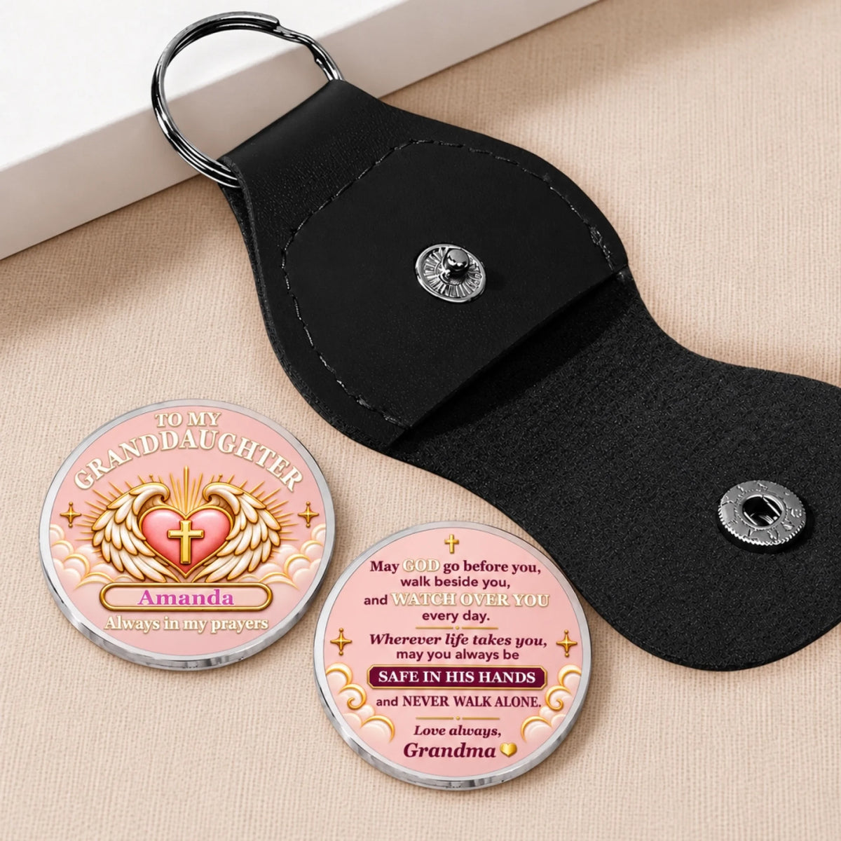 Christian pocket hug for granddaughter showing both sides of the personalized prayer coin with black keychain holder